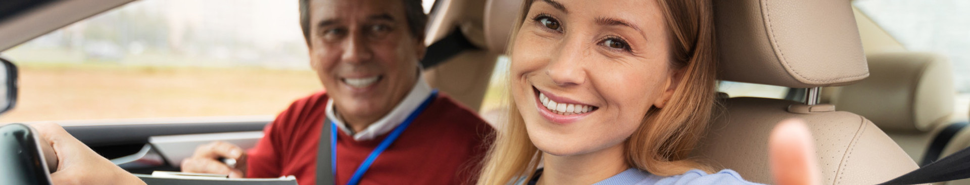 driving-teachers/woman-male-driving-instructor-driving-test